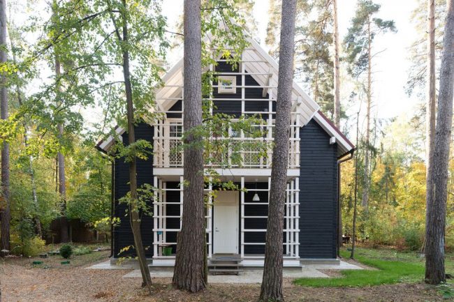 Дом из бруса с мансардой в скандинавском стиле
