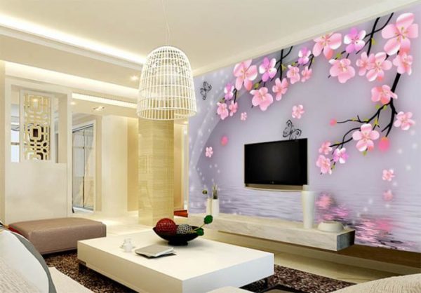 Розовая сакура на стене в гостиной 