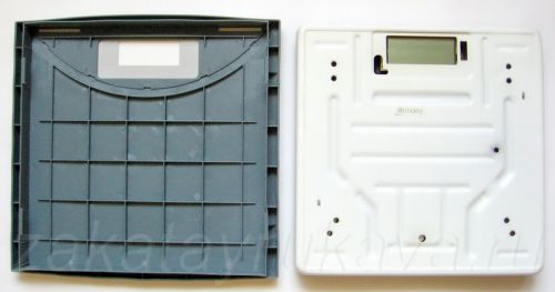 Разборка электронных весов MARTA MT-1650. Снятие декоративной пластмассовой крышки.