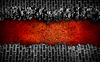 Рассеянная черной кирпичной стеной с большим красным отверстием | Фото
