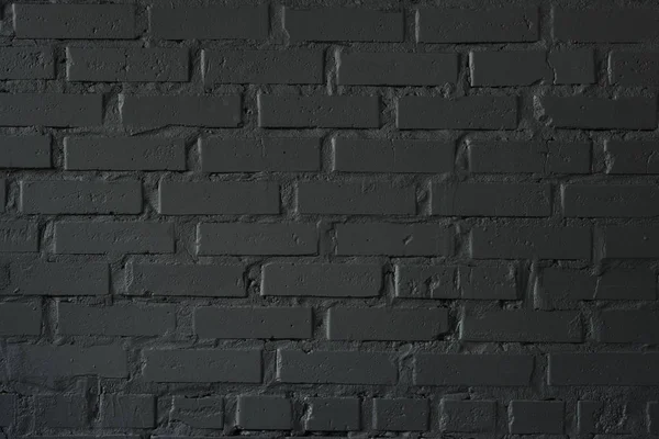 Черный фон кирпичной стены — стоковое фото